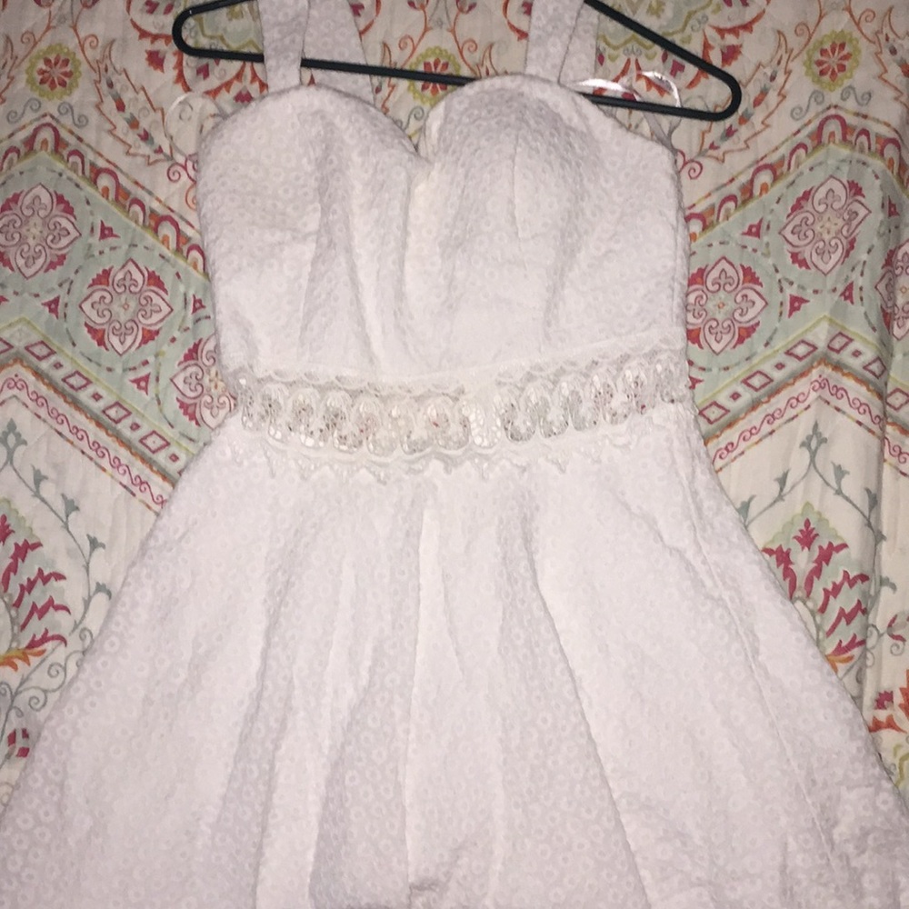White skater style dress with lace detailed middle